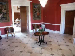 Entrance Hall. Painted red for a film. We liked it so left it red.
